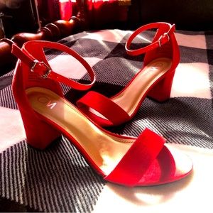 Women’s size 8 CCM Glory red heels